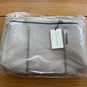 State of Escape Perforated Tan Tote Bag